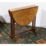 A small Victorian walnut Sutherland table, 60cm wide