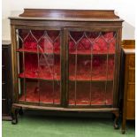 A 1920s mahogany display cabinet, 122cm wide x 122cm tall