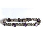 A silver, marcasite and amethyst bracelet