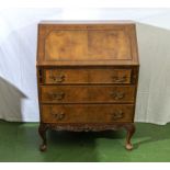 A 20th century walnut bureau