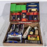 A box of Tetley figures together with a box of Tetley model vehicles