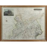 A framed map of the Northern part of Roxburghshire with a vignette of Melrose Abbey, engraved by N R