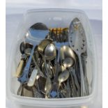 A box of assorted cutlery