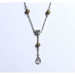 A silver dropper necklace