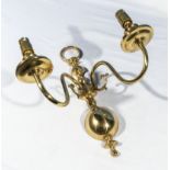 A brass two branch sconce