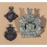 A KOSB cap badge together with a silver Coldstream cycling club medal 1889 and a silver Coldstream