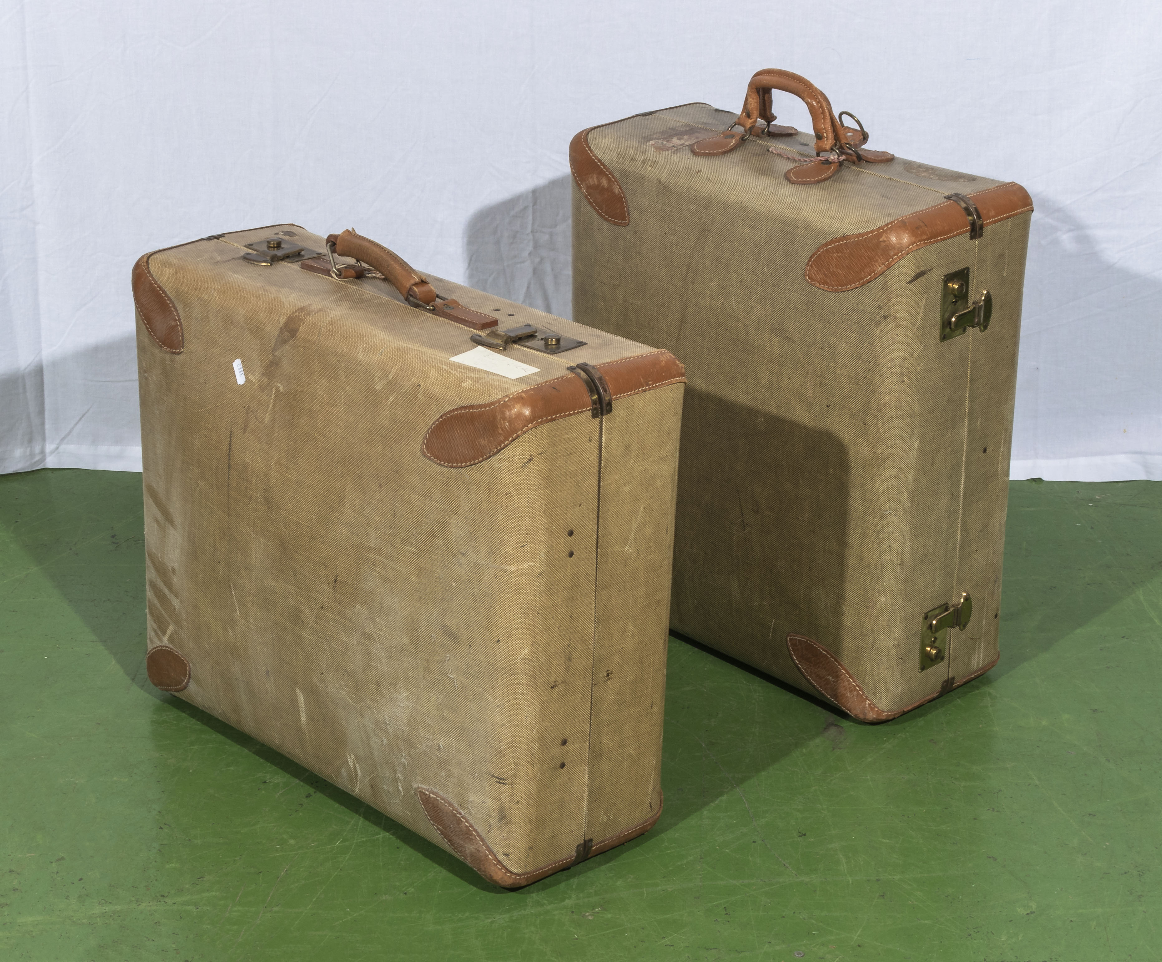 Two vintage suitcases, 58cm x 48cm and 48cm x 52cm and 20cm deep