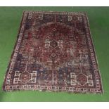 A Persian style rug 185cm x 132cm