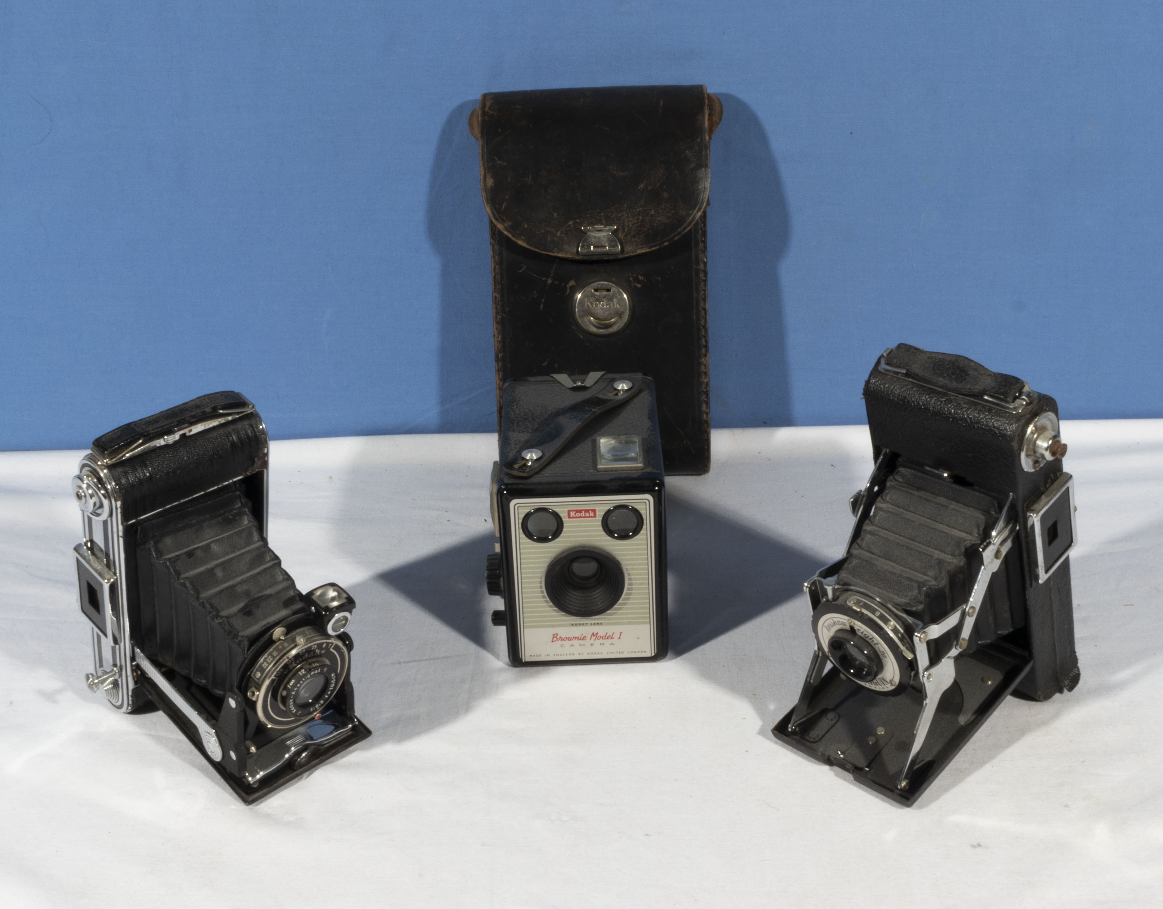 Three vintage Kodak cameras