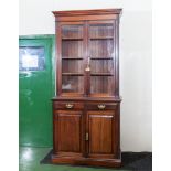 A late Victorian mahogany bookcase, 107cm wide x 48cm deep x 234cm tall