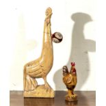 Two wooden cockerel figures