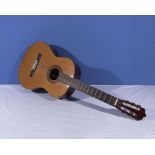 A Santos Martinez acoustic guitar SM44