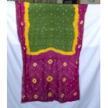 A red/yellow/green vintage silk sari, some slight damage, size 4.8mtr x 103cm