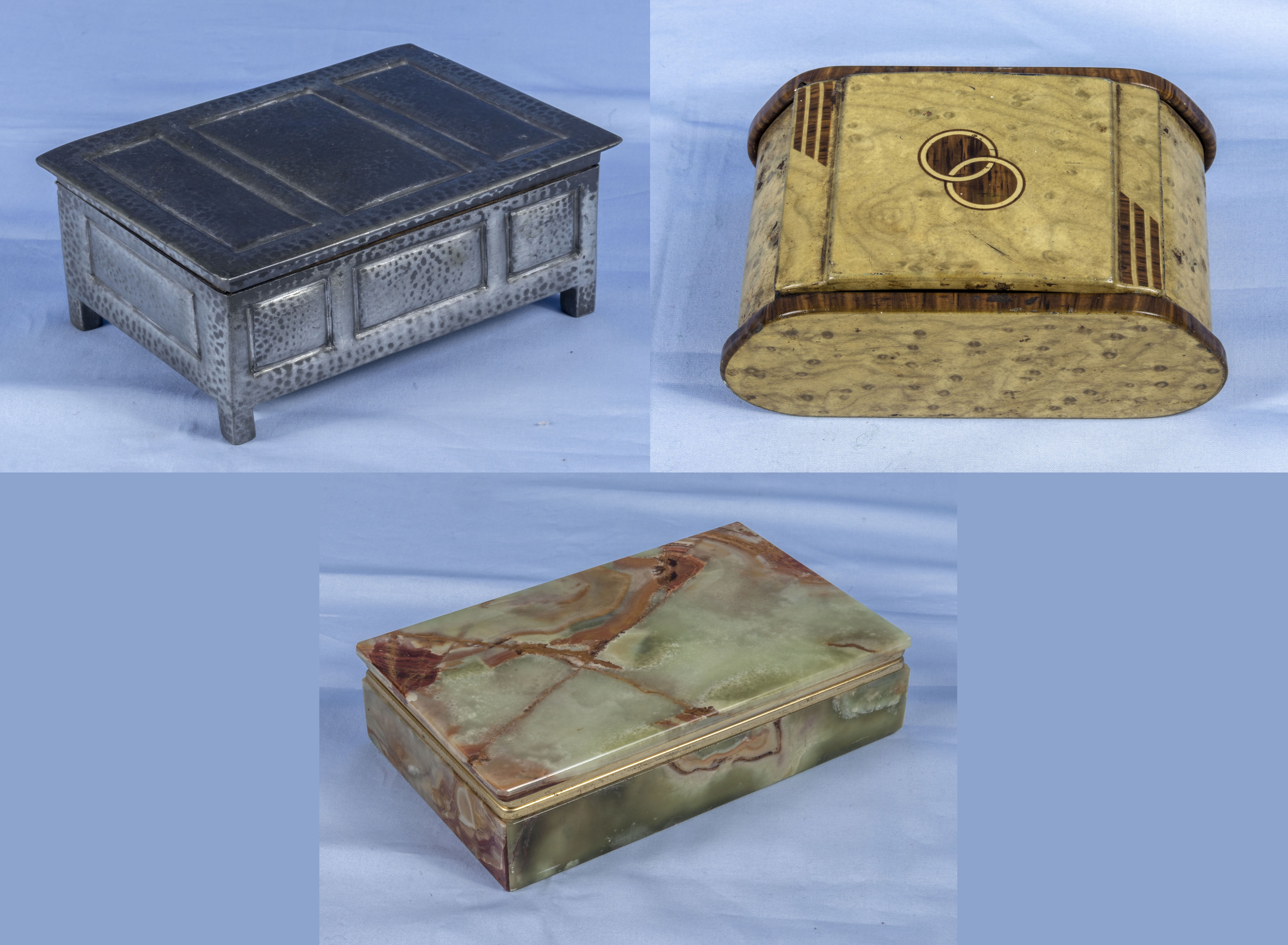 Three cigarette boxes, Liberty pewter, onyx and a painted Deco box