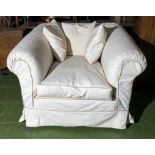 A large upholstered armchair 115cm x 115cm