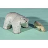An Inuit polar bear and one other carving