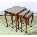 A nest of three tables