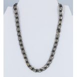 A white metal and bead necklace