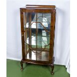 A 1950's glazed display cabinet