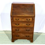 A good quality Edwardian inlaid mahogany bureau. 57cm wide x 47cm deep and 100cm tall