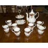 A Royal Albert 'Old Country Roses' Coffee pot, cake stand and eight coffee mugs