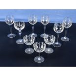 Nine etched glass wine glasses