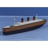A small model of an ocean liner 40cm long