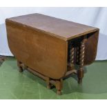 An oak drop leaf table