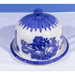 A large blue and white ceramic cheese dome