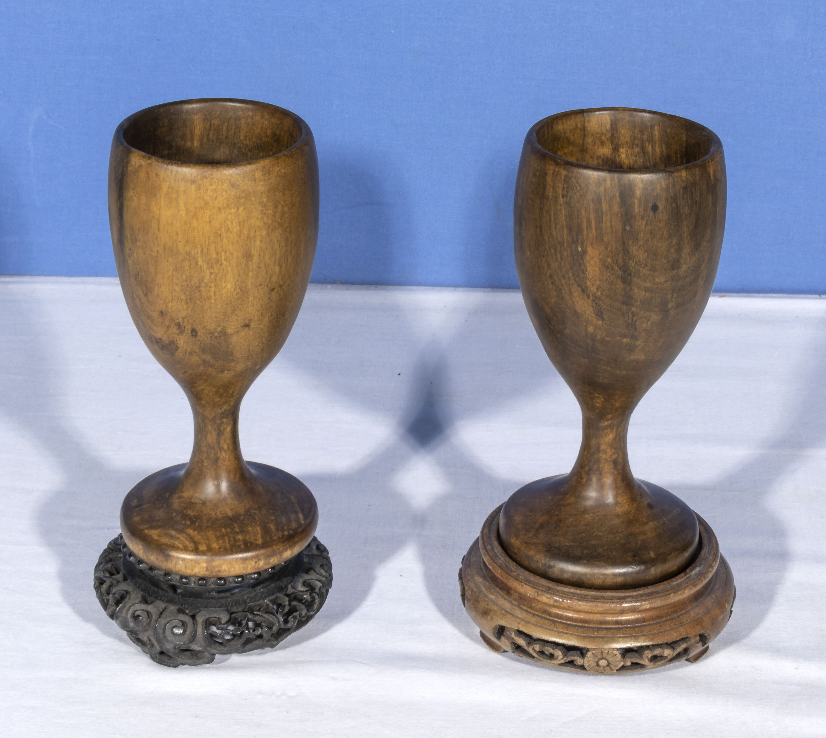 A small leather case, two wood goblets and stands, a pair of medallions, finger plates and tiles - Image 3 of 6