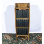 A small bookcase containing the works of Charles Dickens, 18 volumes 96cm x 33cm