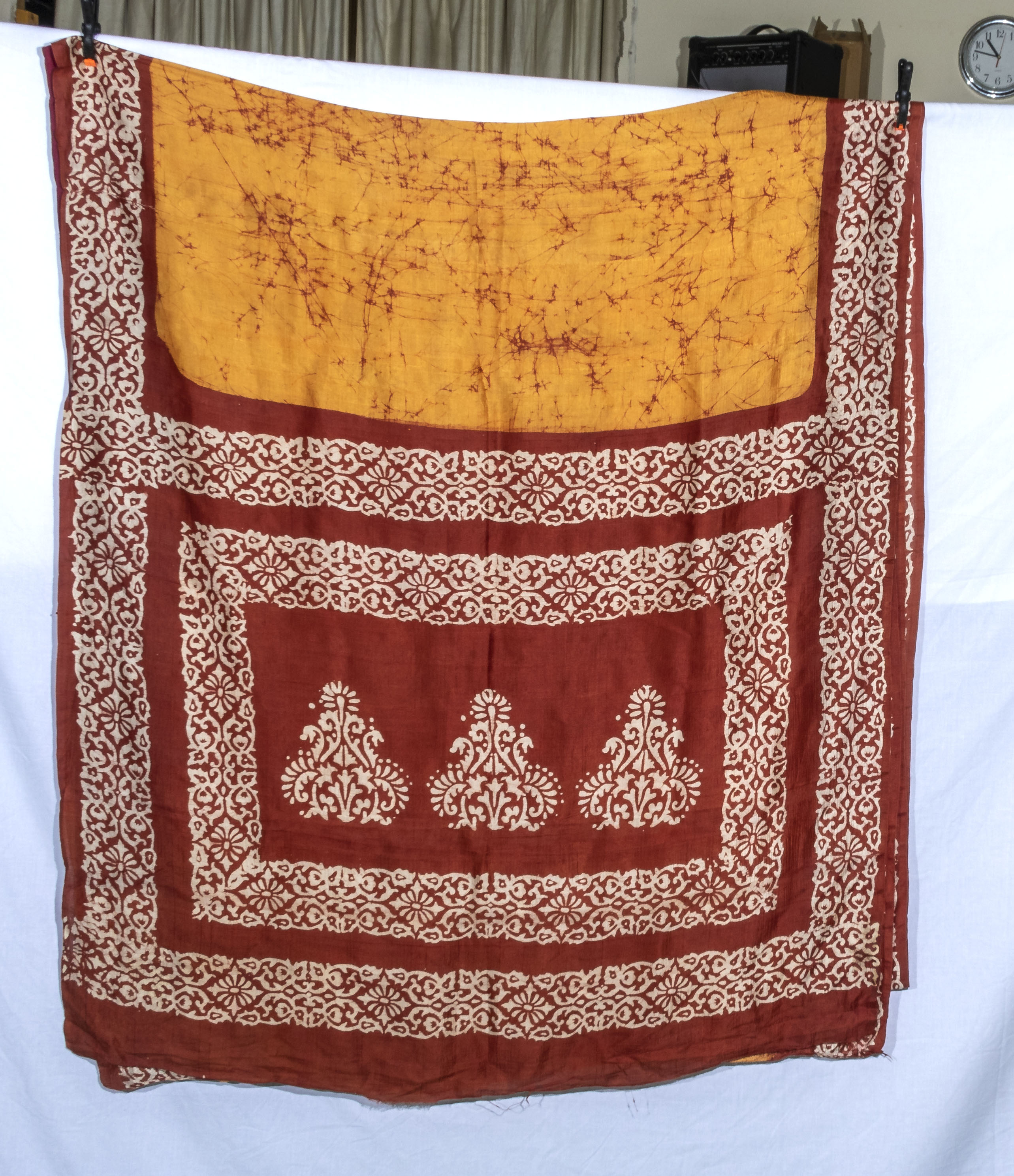 A vintage brown/gold Batik silk sari, has a sewn repair, size 5.20tr x 112cm