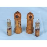 A pair of antique treen scent bottle holders with screw tops and bottles