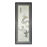 A framed Chinese silk scroll embroidered with 110cm x 40cm