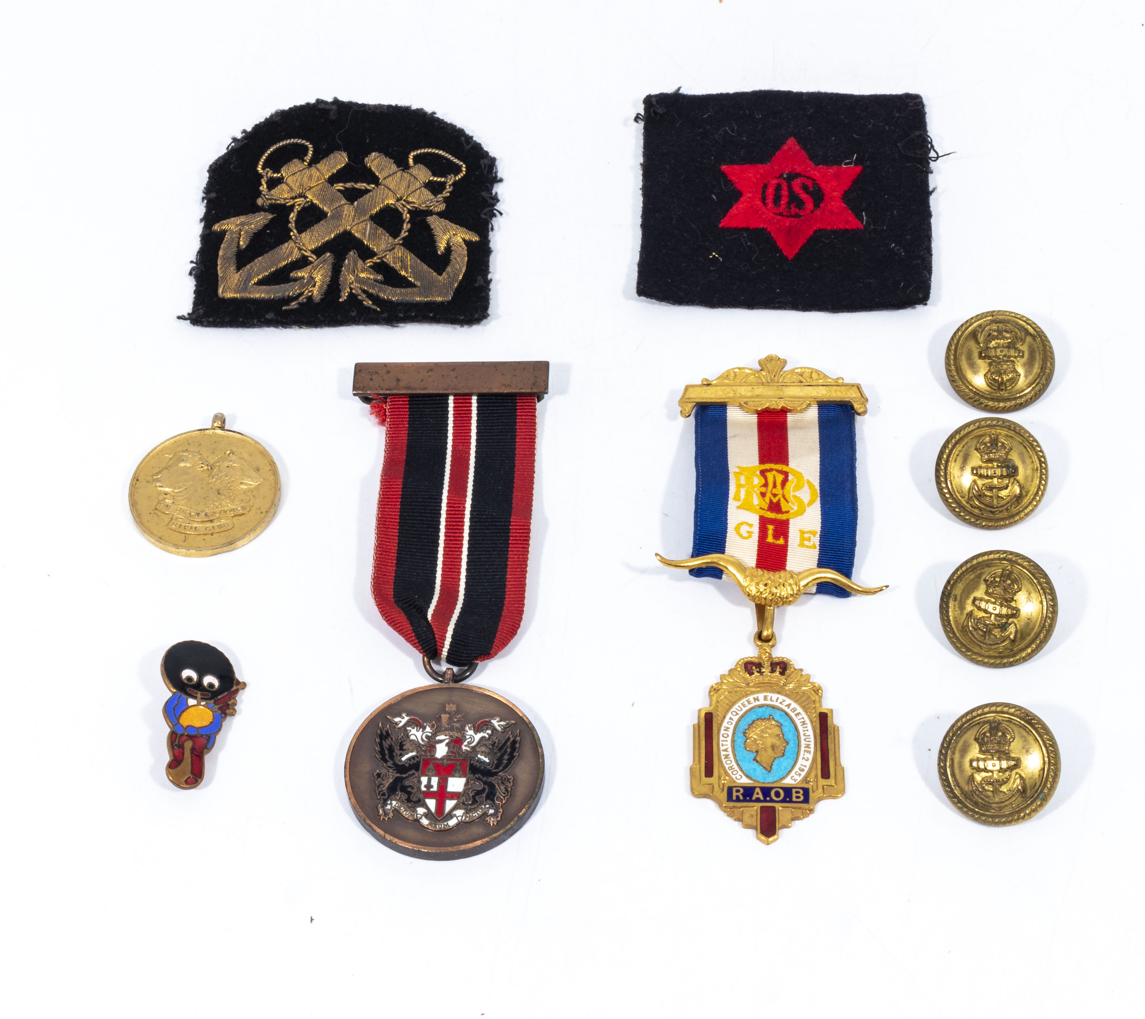 A collection of medallions and buttons