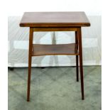 An Edwardian cross banded mahogany turn-over card table. 90cm x 45cm