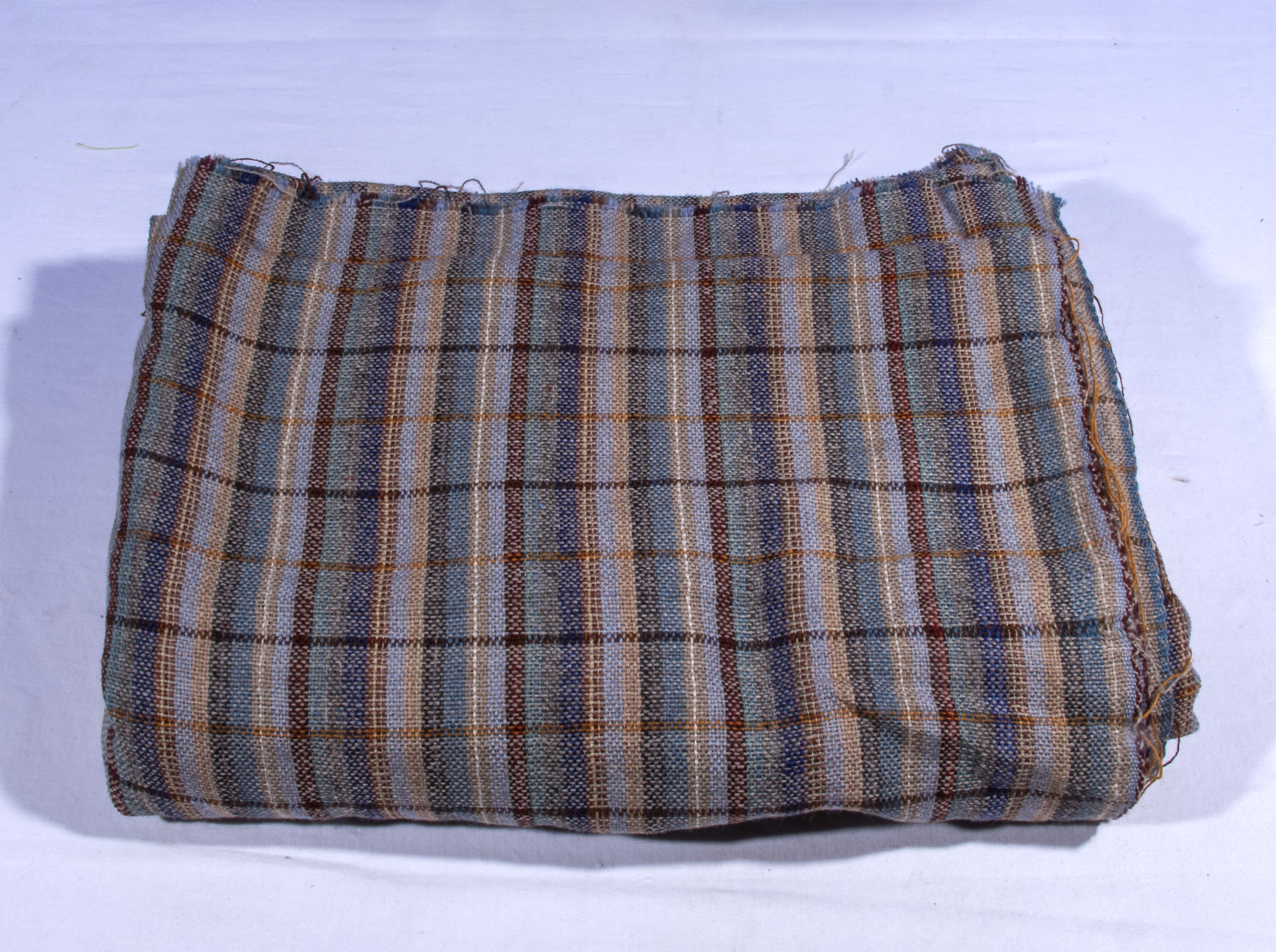 A piece of plain weave check lightweight fabric size 4.28mtr x 1.55mtr