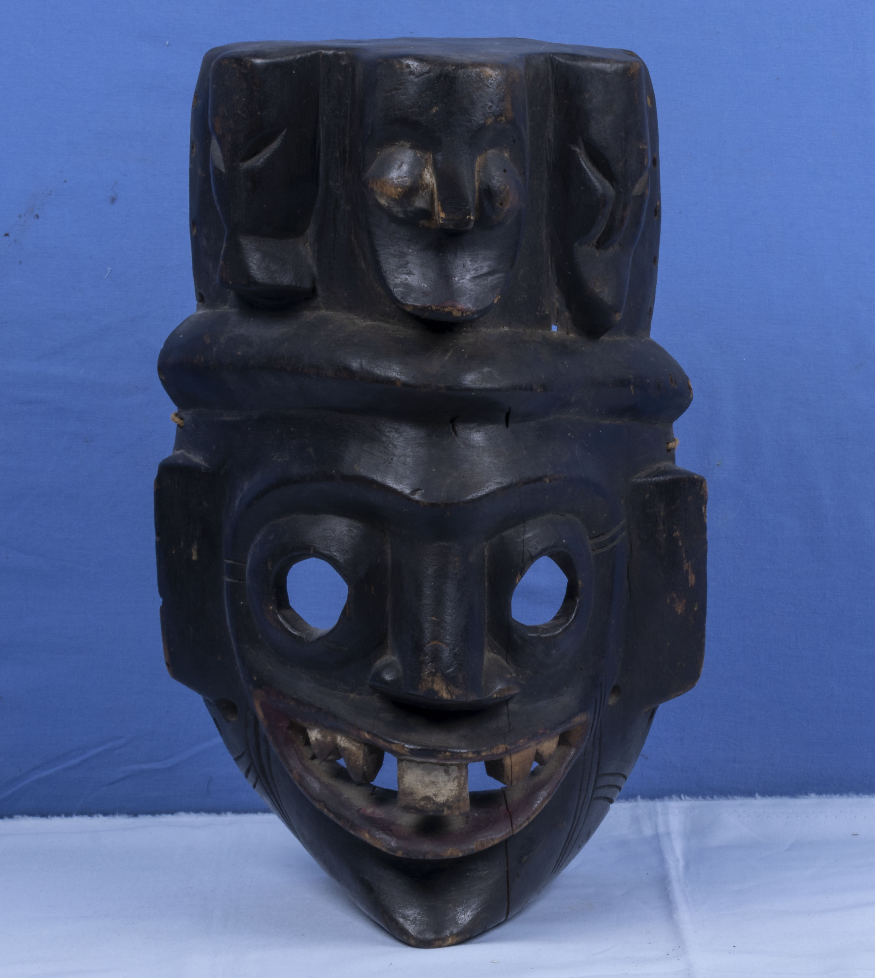 Antique hand-carved wooden mask