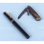 A vintage Osmiroid fountain pen and a horn pocket knife