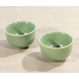 Two Q'ing Dynasty style celadon tea bowls