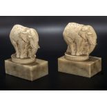 A pair of elephant book ends