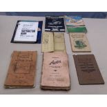 A collection of vintage car manuals and others