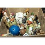 A box of pottery animals and figures