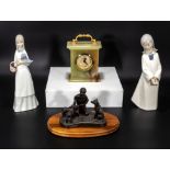 Two Spanish figures, mantle clock and another figure group