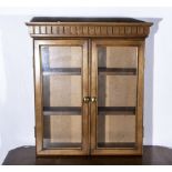 A small mahogany wall cabinet 60cm x 53cm x 14cm