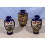 A pair of Oriental vases and one other
