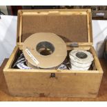 Wooden box containing reels of electric cable