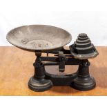 A set of cast scales and weights