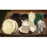 A box of assorted breweriana water jugs and ashtrays