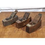 Three vintage wooden planes